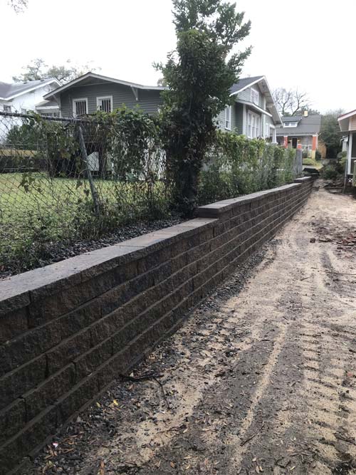 After — newly installed retaining wall
